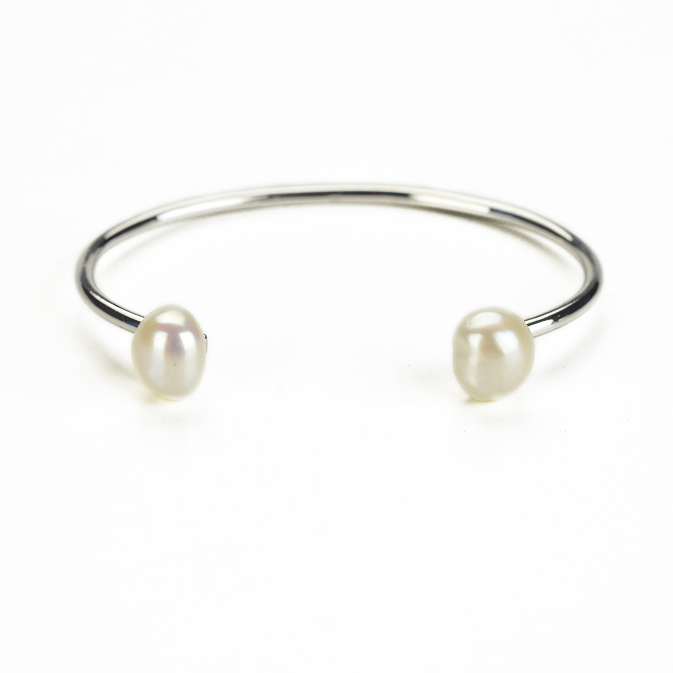 Open cuff bracelet in sterling silver and pearls