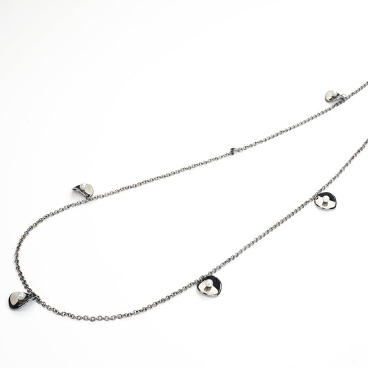 Long gold necklace with pearls