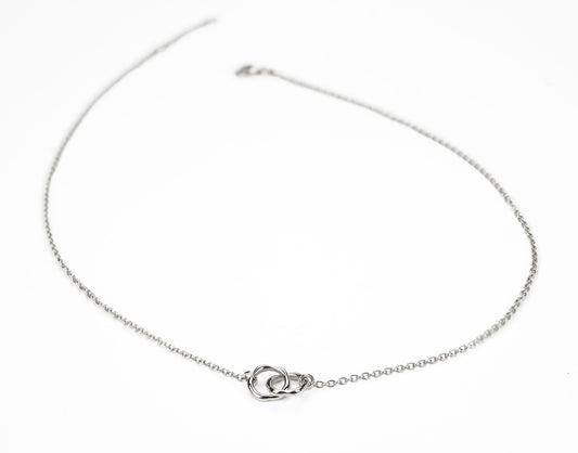 Infinity white gold necklace
