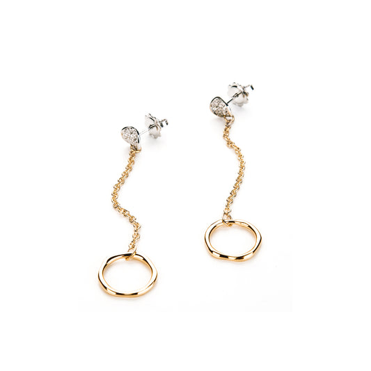Dangling earrings in rose gold and diamonds
