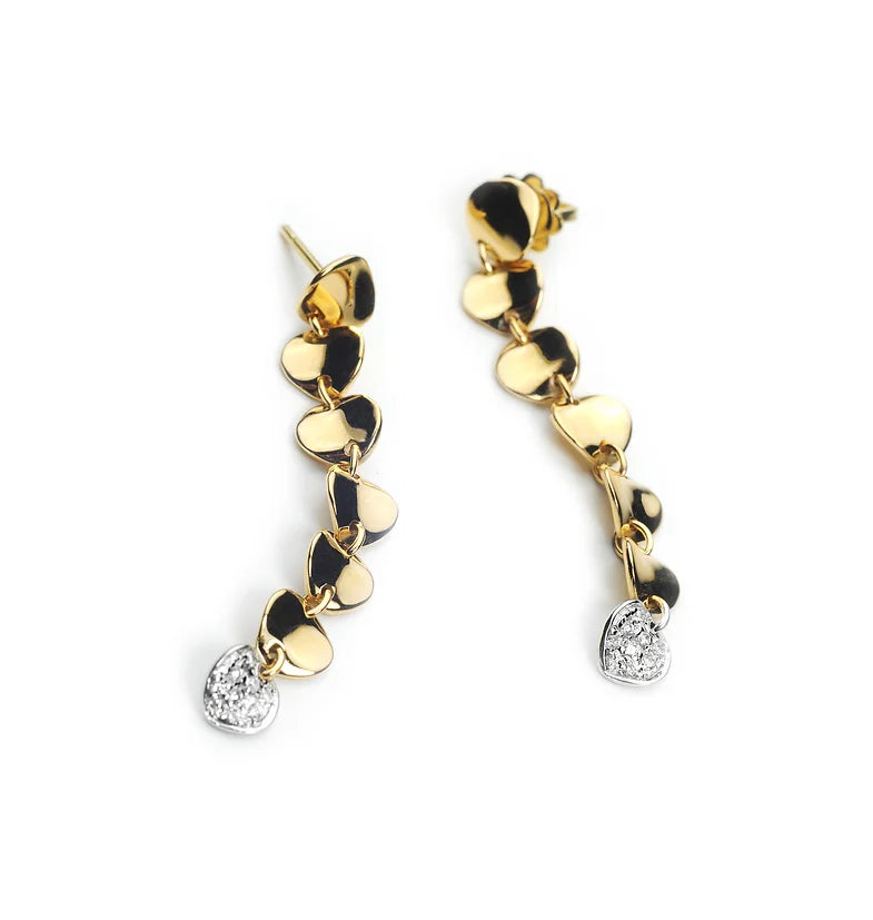 Long hanging earrings in gold and diamonds