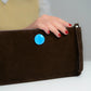 Clutch bag in brown leather with enameled silver disc