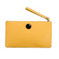 Clutch bag in yellow leather with enameled silver disc