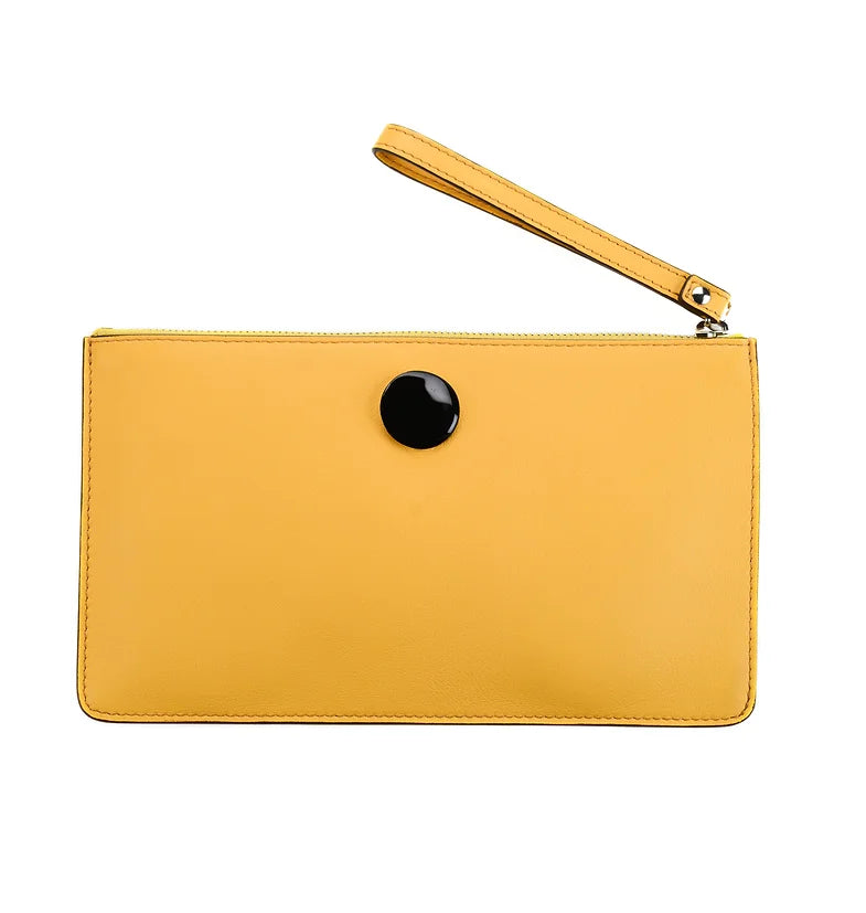 Clutch bag in yellow leather with enameled silver disc