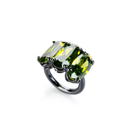 Trilogy ring in sterling silver and green zircons