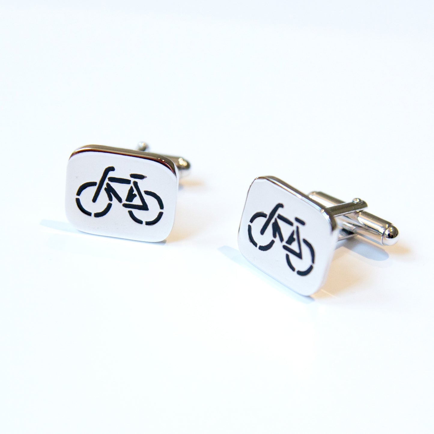 Bycicle cufflinks in silver and red enamel
