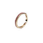 Wavy eternity ring in gold and rubies